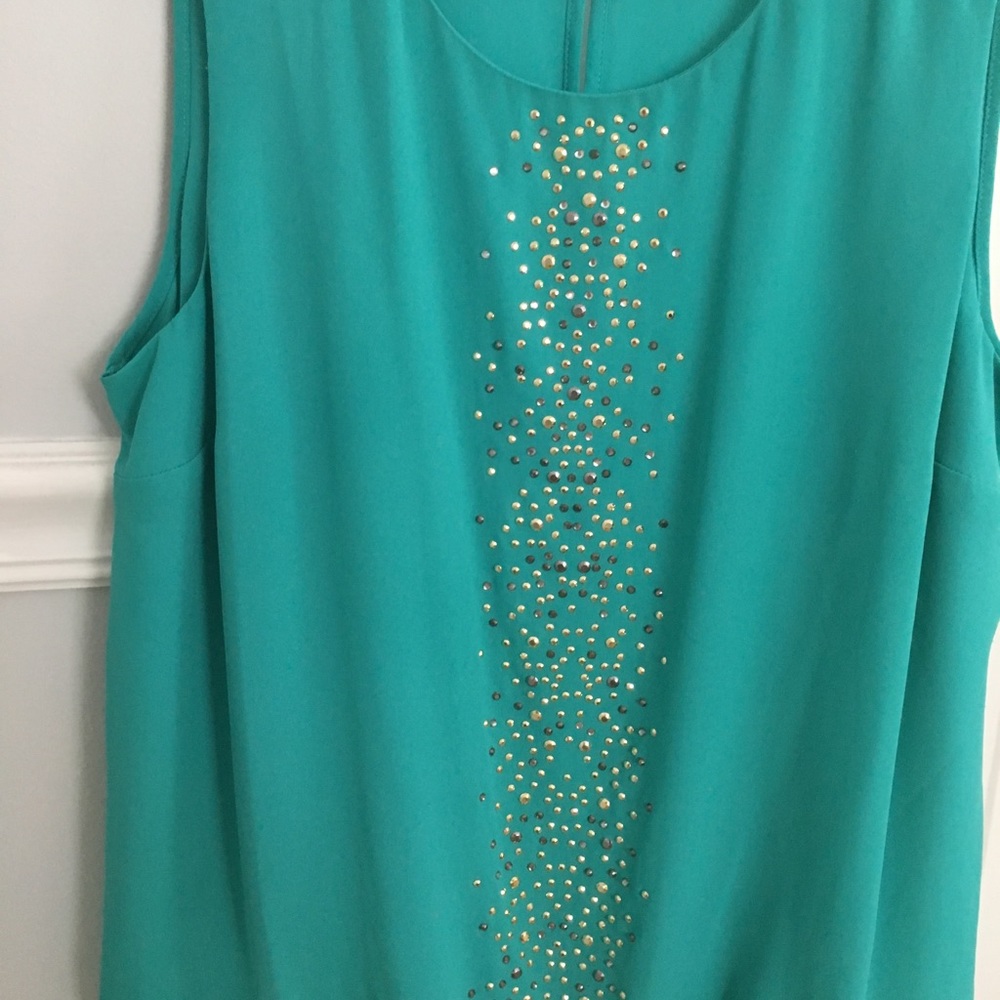 Teal top with gold and silver accents size medium